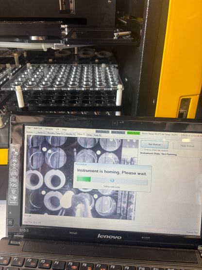Open laptop displaying a diagnostic screen with a yellow border