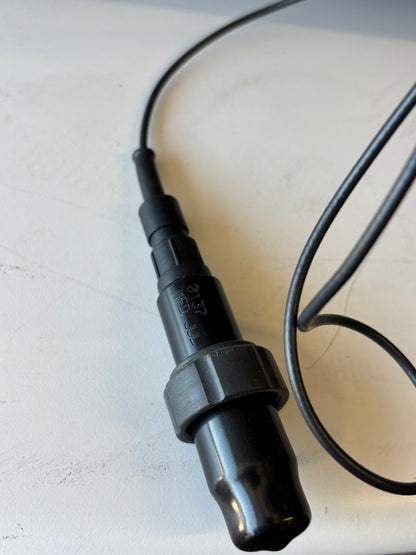 Black electrical plug on a white background