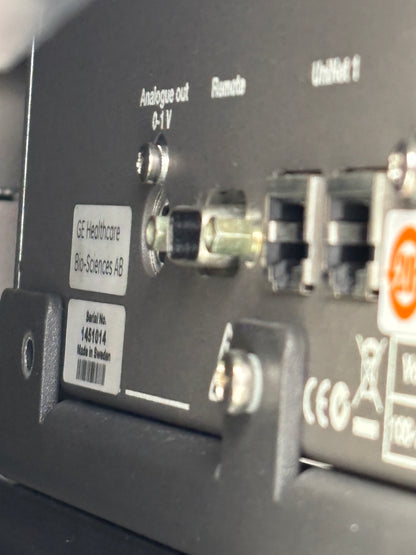 Close-up of electronic equipment with labels and connectors