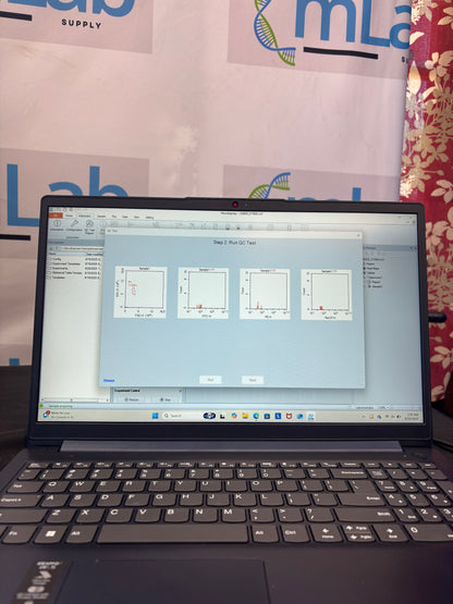Open laptop displaying a software interface on a floral-patterned surface