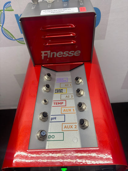 Red device with 'Finesse' branding and various ports on a white background