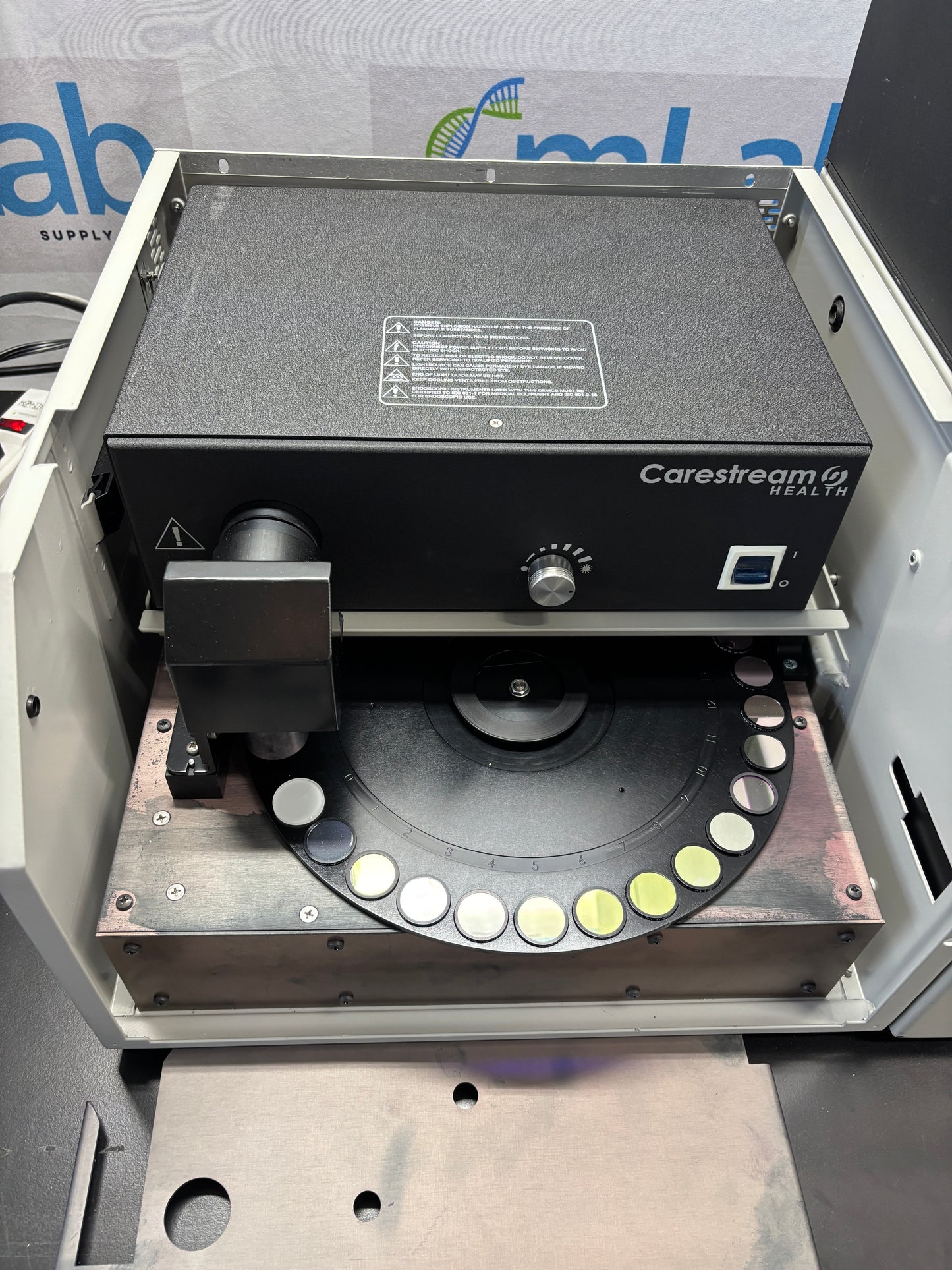 Medical imaging device with 'Carestream' branding on a gray background