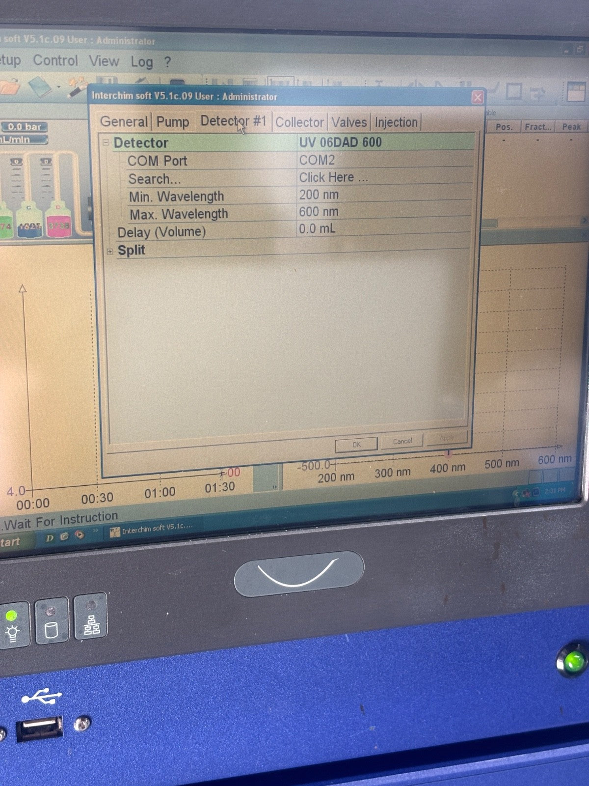 Computer screen displaying a software interface with text and options on a blue machine.